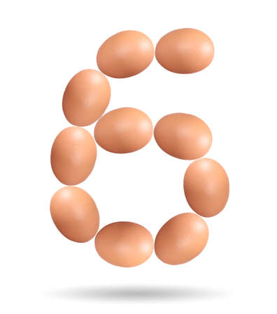 Number six made of Easter Eggs isolated on white background.Chicken eggs number 6 isolated on white background.の写真素材