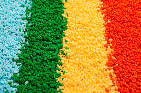 colored rice for the development of fine motor skillsの写真素材