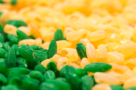 colored rice for the development of fine motor skillsの写真素材