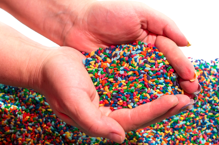 colored rice for the development of fine motor skillsの写真素材