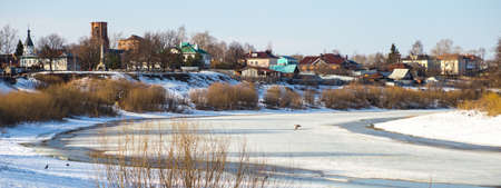 the snow melts in the spring riverの写真素材