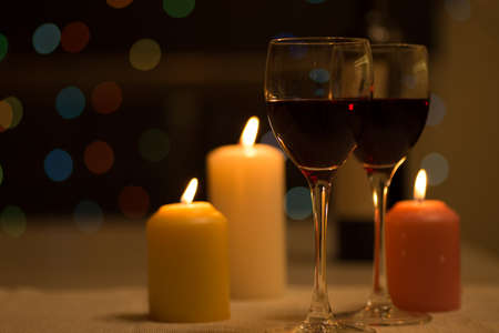 Romantic dinner with candles and wineの写真素材