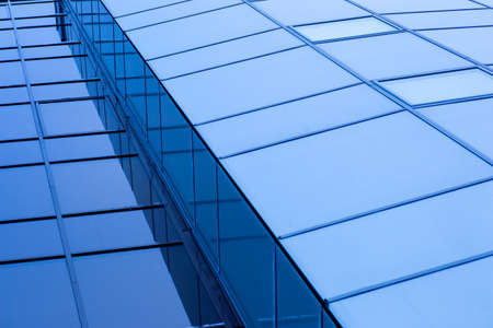 a glass house wall city background