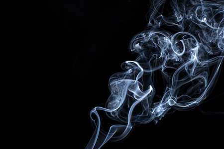 white smoke on black background