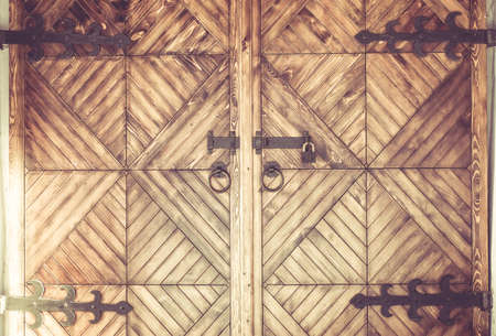 vintage wood gate with metal round handleの写真素材
