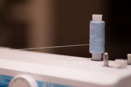 sewing machine in workの写真素材