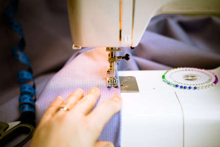 sewing machine in work