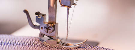 sewing machine in work