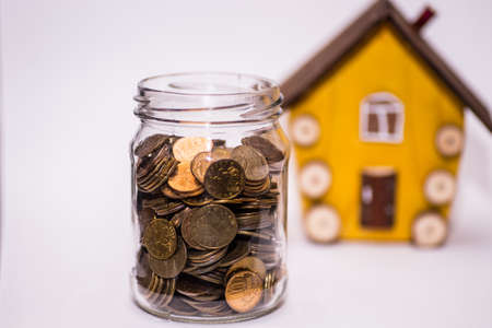 a scattering of coins on a black backgroundの写真素材
