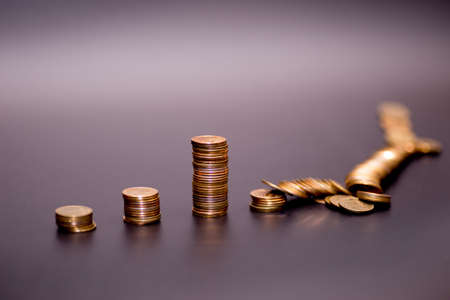 gold coin stack isolated on backの写真素材