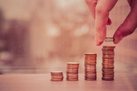 rising graph made of coinsの写真素材