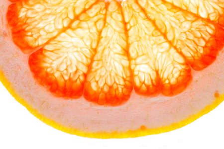 Grapefruit slice on white backgroundの写真素材