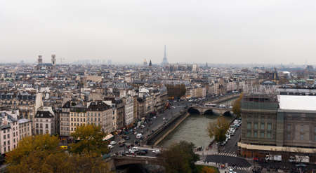 PARIS, FRANCE - NOVEMBER 29, 2013: Gargoyle of the Cathedral of Notre Dame de Paris overlooking Paris, Franceのeditorial素材