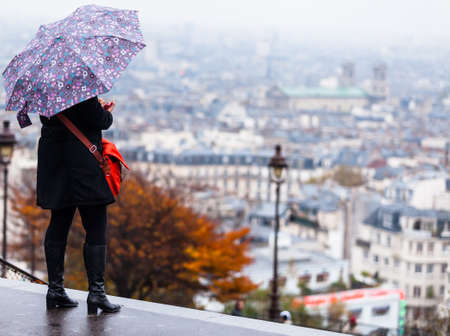 PARIS, FRANCE - NOVEMBER 29, 2013: Tourists in Montmartre. Monmartre area is popular among tourists in Paris, the most visited city worldwide.のeditorial素材