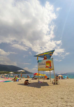 BOL,BRAC,CROATIA - AUGUST 3: Crowded beach of Zlatni Rat on August 03, 2014 in Bol, Croatia. Bol is one of the most famous tourist desinations on the adriatic islands.のeditorial素材