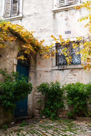 ROVINJ, CROATIA - MAY 29, 2014: Tourist people walk the old town streetsのeditorial素材