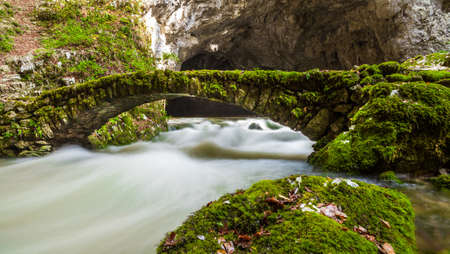 Natural tunnel and bridge in Rakov Skocjan Valleyの写真素材