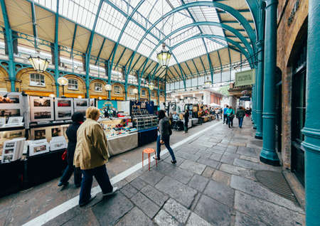 LONDON - OCTOBER 11  Apple market in Covent Garden. October 11, 2013 in London. One of the most popular tourist attraction on Earth. Toned Image.のeditorial素材