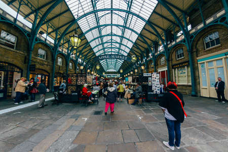 LONDON - OCTOBER 11  Apple market in Covent Garden. October 11, 2013 in London. One of the most popular tourist attraction on Earth. Toned Image.のeditorial素材