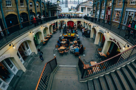 LONDON - OCTOBER 11  Apple market in Covent Garden. October 11, 2013 in London. One of the most popular tourist attraction on Earth. Toned Image.のeditorial素材