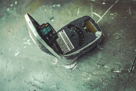 Old Exposure meter on the table. TONED IMAGE.の写真素材