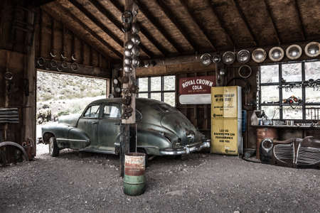 NELSON , USA - JUNE 10 : Rusty old vintage car in abandoned mechanic garage Nelson Nevada ghost town on June 10 ,2015のeditorial素材