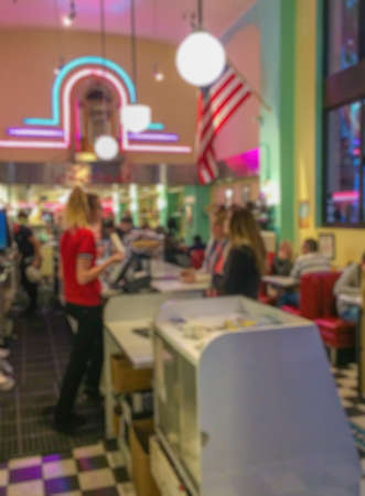 Abstract Blurred background: people order fast foodの写真素材