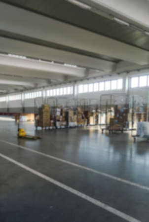 Blurred storehouse as backgroundの写真素材