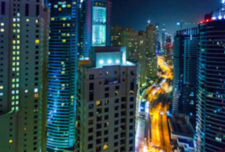 Abstract blurred bokeh lights at night: city aerial viewの写真素材