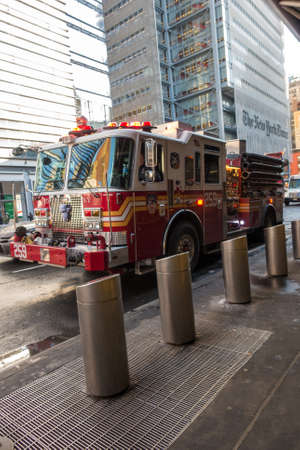 New York City, USA - March 17, 2017: New York Fire Department fire engine with lights flashing on...