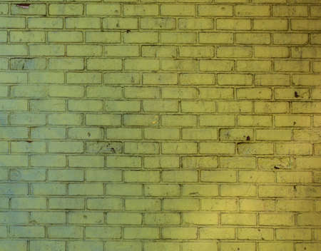 Yellow old brick wall texture pattern grunge background  ,concept to interior designの写真素材