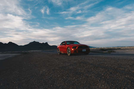 BONNEVILLE ,UTAH, USA JUNE 4, 2015: Photo of a Ford Mustang Convertible 2012 version at Bonneville Salt Flats,Utah,USA. The fifth generation began with the 2005 model year to 2014.のeditorial素材