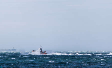 Coast Guard in storm and heavy windの写真素材