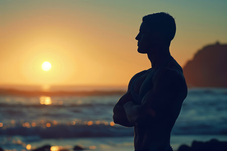 Silhouette of fit man at sunset.の素材