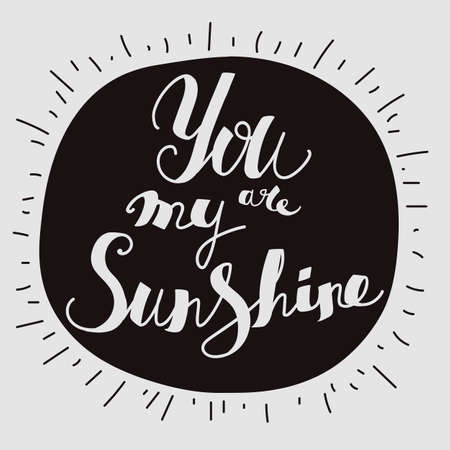 Lettering "You are my sunshine." Uppercase letters, hand-drawing. Light letters on dark circles.のイラスト素材
