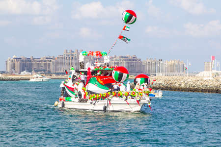 parade of yachts in Dubai Marina in the Independence Day of the UAE