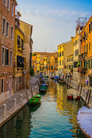sunset on the canal in Veniceの写真素材