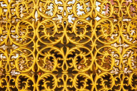 background beautiful gilded ornamental grille gate in Istanbulの写真素材