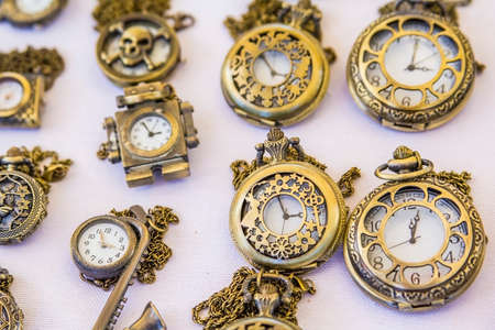 Blur background vintage gilded clock shop