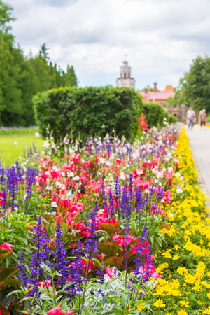 background landscape view of the bright colorful garden and a new castle in Sigulda, near Riga, Latviaの写真素材