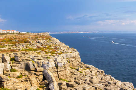 background landscape view of the rocks and the Atlantic Ocean to the Peniche peninsula, near the island of Berlenga, Portugalの写真素材