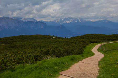 Landscape view of the walking trail near the observation deck on the top of the mountain, in the vicinity of Bolzano, Italyの写真素材