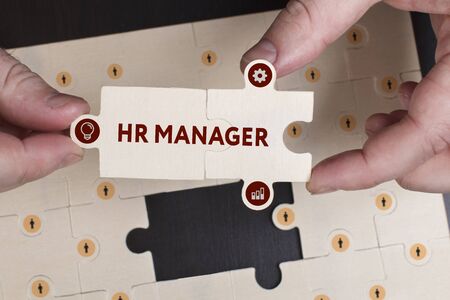 Business, Technology, Internet and network concept. Young businessman shows the word: HR manager