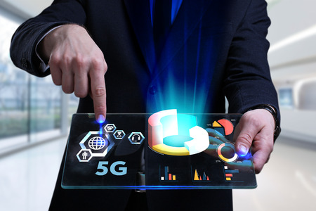 Business, Technology, Internet and network concept. Young businessman working on a virtual screen of...