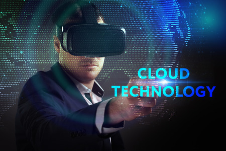 Business, Technology, Internet and network concept. Young businessman working in virtual reality...