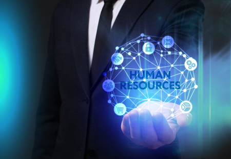 Business, Technology, Internet and network concept. Young businessman working on a virtual screen of the future and sees the inscription: Human resourcesの写真素材