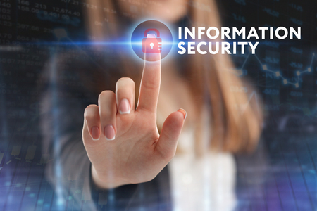 The concept of business, technology, the Internet and the network. A young entrepreneur working on a virtual screen of the future and sees the inscription: Information securityの写真素材