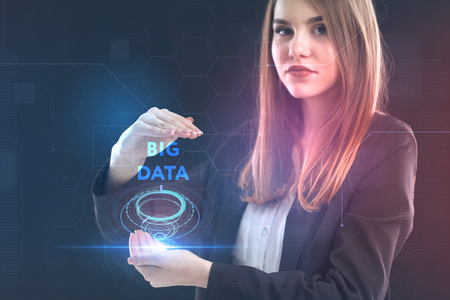 The concept of business, technology, the Internet and the network. A young entrepreneur working on a virtual screen of the future and sees the inscription: Big dataの写真素材