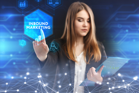 The concept of business, technology, the Internet and the network. A young entrepreneur working on a virtual screen of the future and sees the inscription: Inbound marketingの写真素材