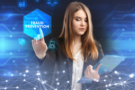 The concept of business, technology, the Internet and the network. A young entrepreneur working on a virtual screen of the future and sees the inscription: Fraud preventionの写真素材